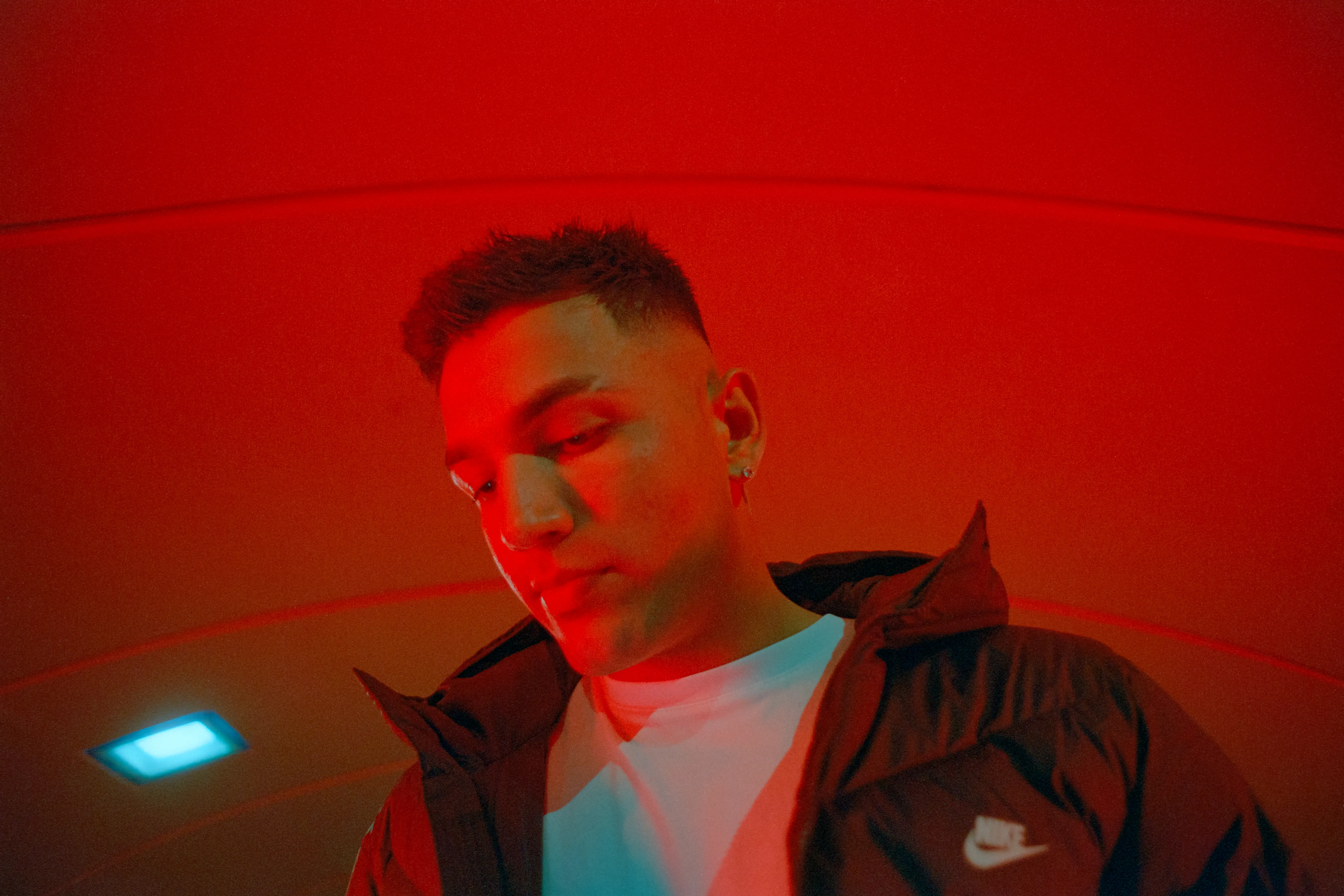 niddy in a bright red tunnel