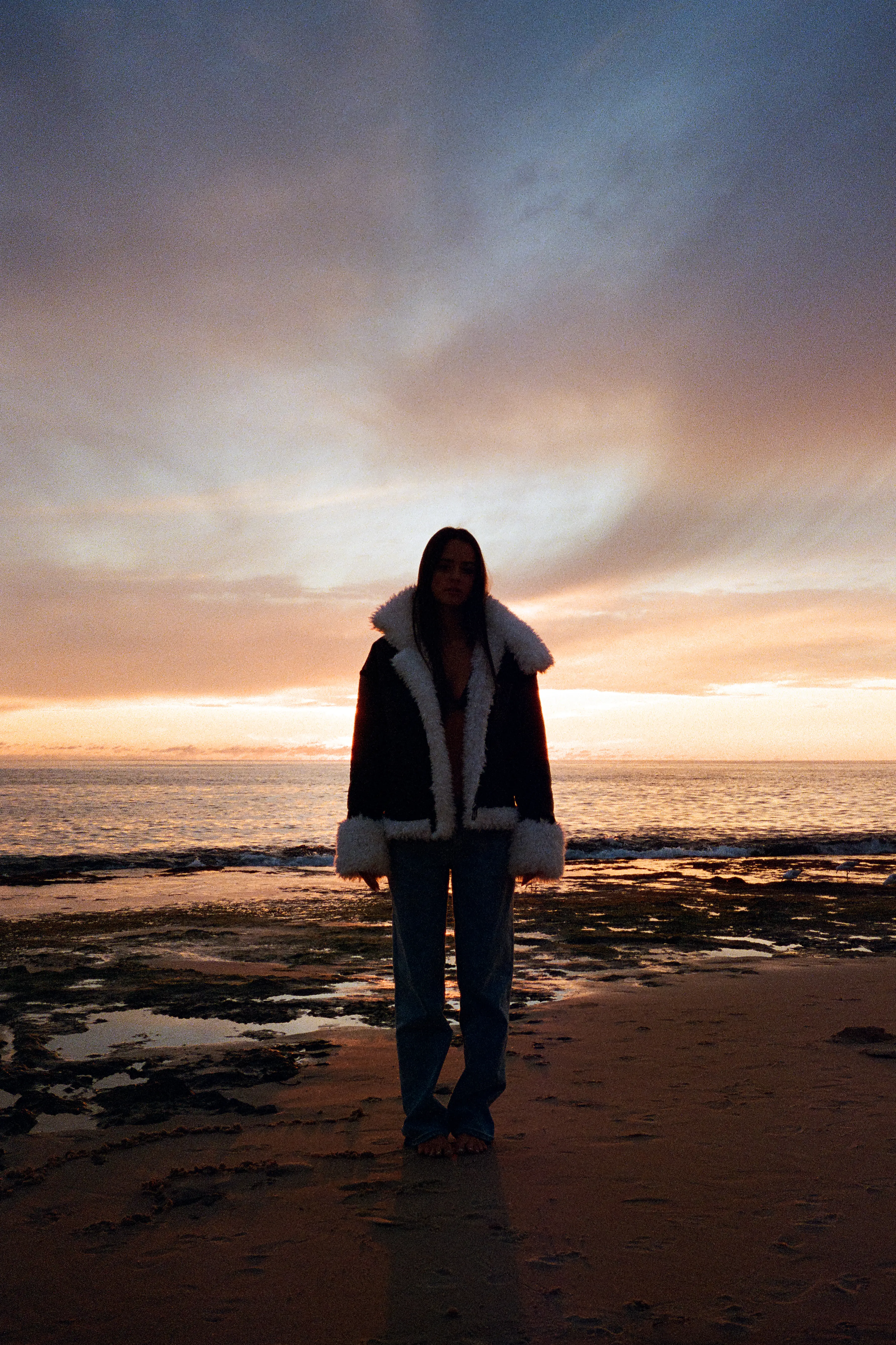 jess on the beach at sunset